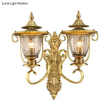 Colonial Curved Arm Brass Gold Wall Sconce With Clear Glass Shade - 1/2 Head Mounted Lamp