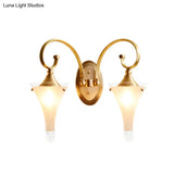 Colonial Gold Flared Wall Sconce With Frosted White Glass - Scrolled Arm Design