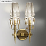 Colonial Gold Wall Sconce With Clear Glass Tapered Design 1/2-Light Porch Lighting