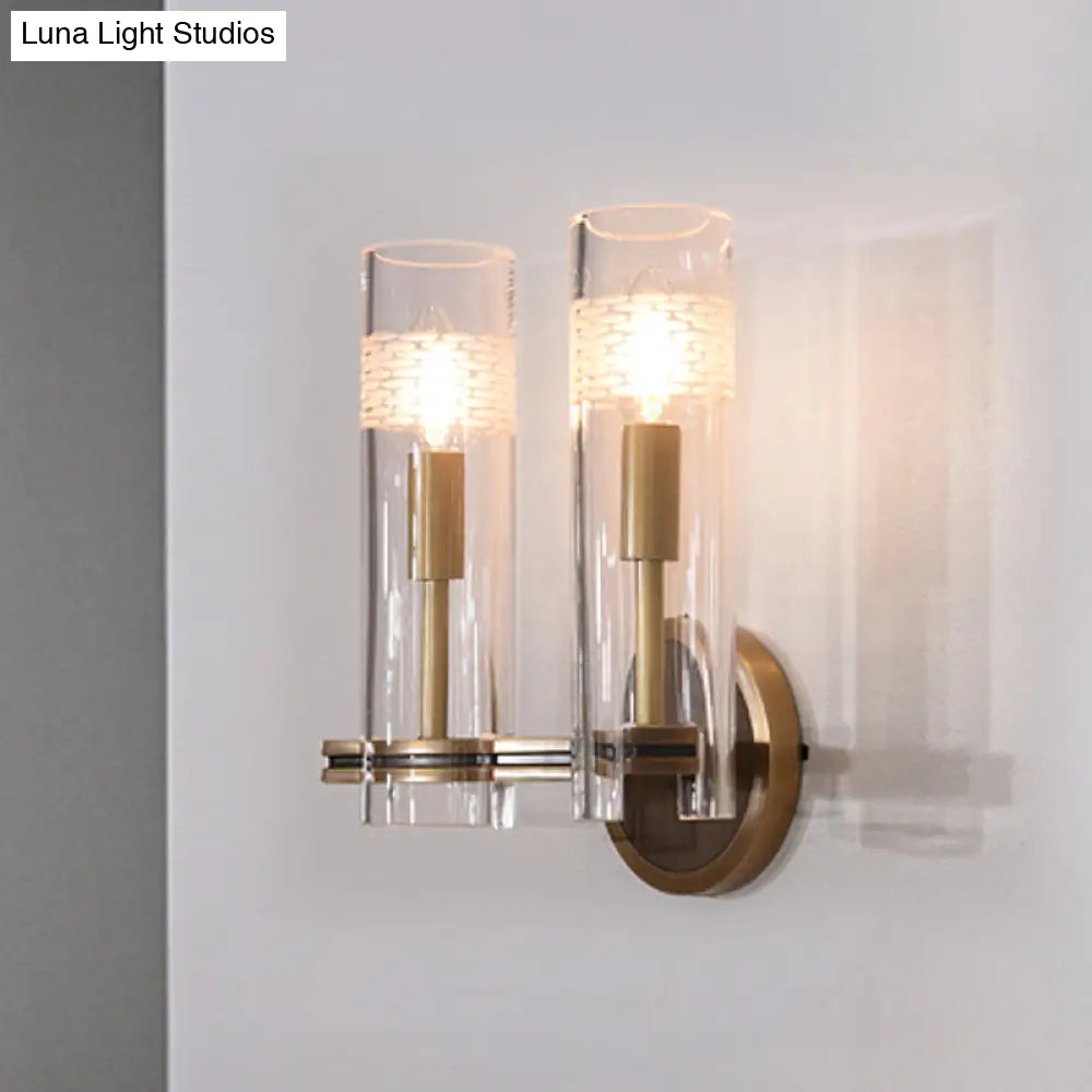 Colonialist Gold Wall Sconce With Clear Cylindrical Glass - Perfect For Living Room Lighting