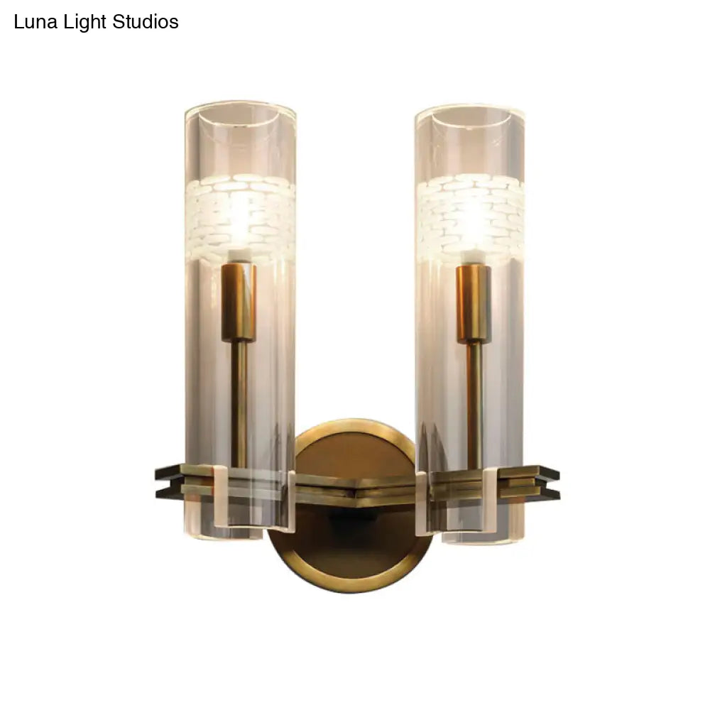 Colonialist Gold Wall Sconce With Clear Cylindrical Glass - Perfect For Living Room Lighting