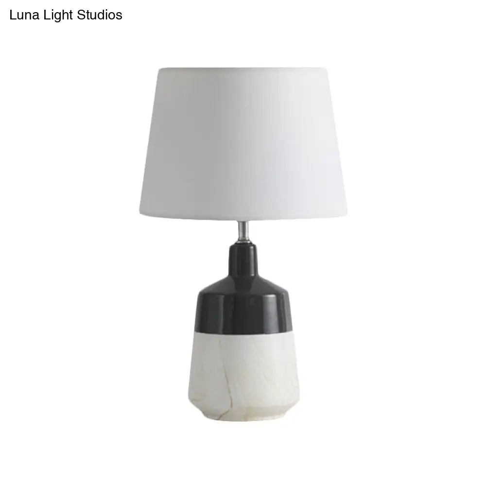 Contemporary 1-Head Bedside Night Lamp In White With Ceramic Base: Fabric Drum Table Lighting