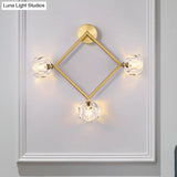 Contemporary 3-Head Brass Wall Sconce With Modo Crystal Shade - Ring/Square Light Fixture
