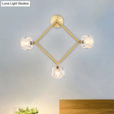 Contemporary 3-Head Brass Wall Sconce With Modo Crystal Shade - Ring/Square Light Fixture