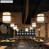 Contemporary Bamboo Cage Hanging Lamp With Coffee Finish And Single Bulb Suspension