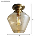 Contemporary Brass Flush Ceiling Fixture With Amber Glass Lampshade