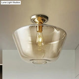 Contemporary Brass Flush Ceiling Fixture With Amber Glass Lampshade