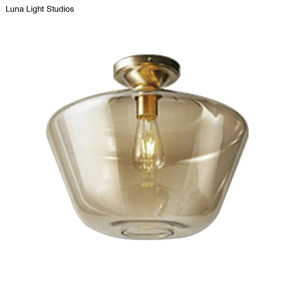 Contemporary Brass Flush Ceiling Fixture With Amber Glass Lampshade