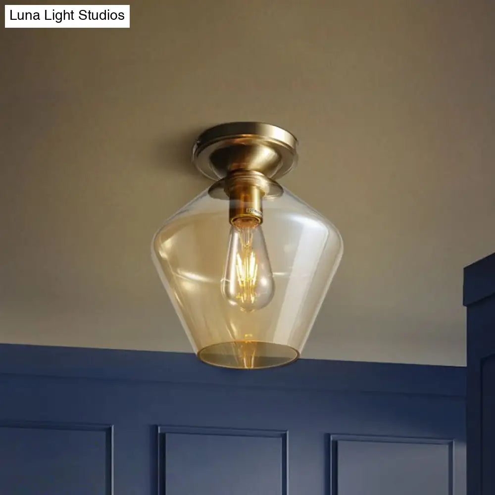 Contemporary Brass Flush Ceiling Fixture With Amber Glass Lampshade