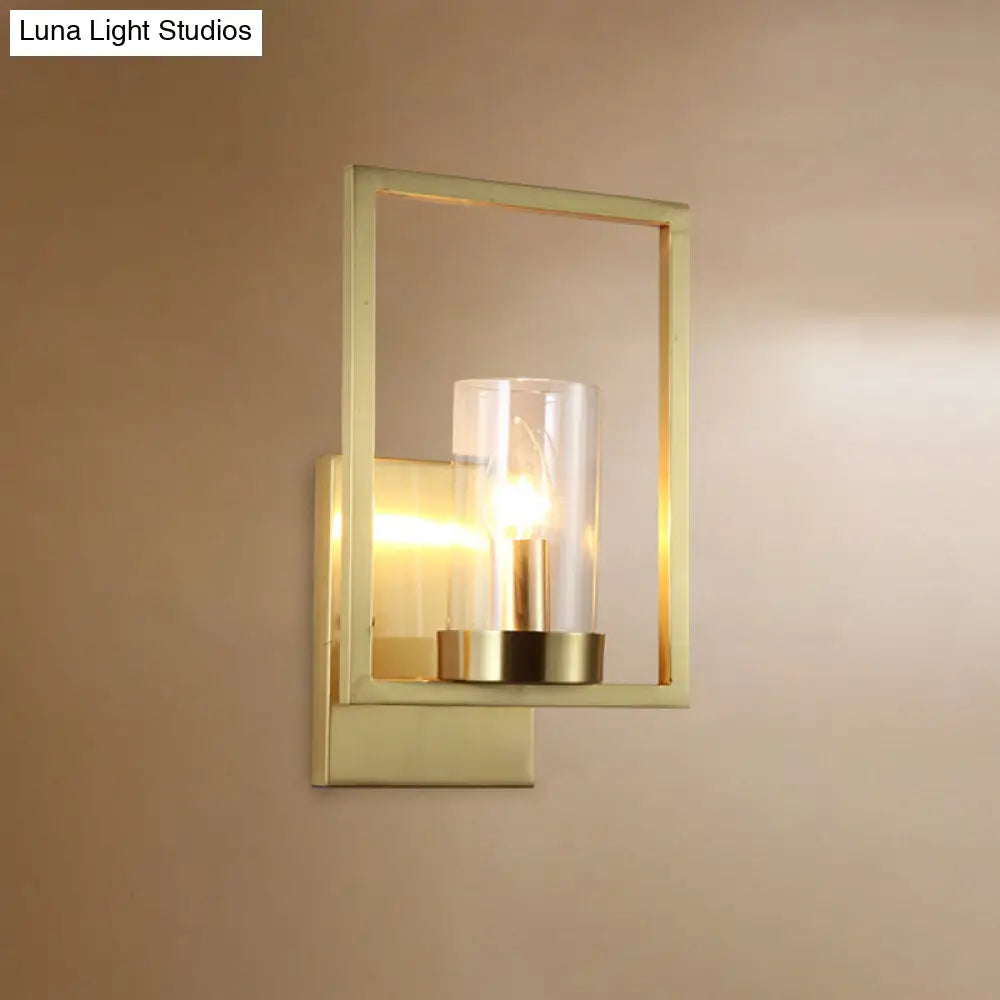 Contemporary Brass Wall Sconce With Clear Glass Shade - Cylindrical Bedroom Light Fixture