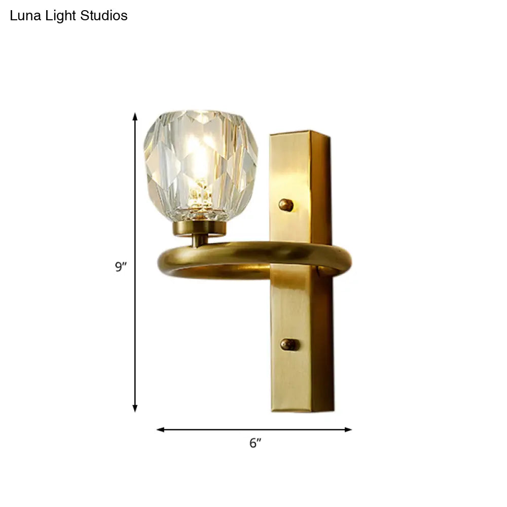 Contemporary Brass Wall Sconce With Global Crystal Shade - Elegant Dining Room Lighting