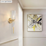Contemporary Clear Crystal Wall Lamp With Gold Cylinder/Tapered Shade - 1 Light Sconce Fixture