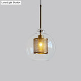 Contemporary Clear Glass Metal Pendant Light For Dining Room - 1-Light Orb Design