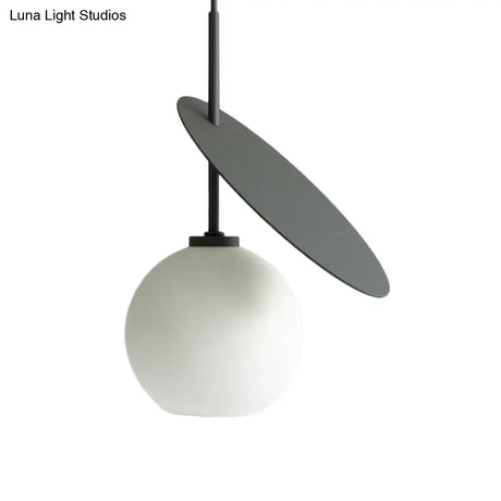 Contemporary Glass Globe Pendant Light With Metallic Circle - Ideal For Restaurants