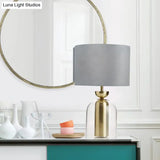 Contemporary Gold Bell Table Light With Clear Glass Shade - Elegant Bedside Desk Lamp