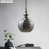 Contemporary Hammered Glass Pendant Light for Boutique Kitchen - 1 Bulb Globe Suspension Light