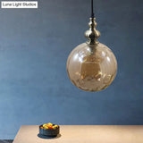 Contemporary Hammered Glass Pendant Light for Boutique Kitchen - 1 Bulb Globe Suspension Light