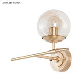 Contemporary Hand Blown Glass Wall Light With Brass Globe And Crossed Arm