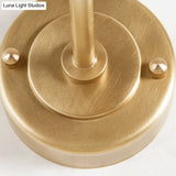 Contemporary Hand Blown Glass Wall Light With Brass Globe And Crossed Arm