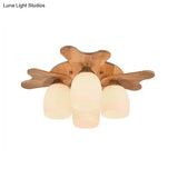 Contemporary Milk Glass Flush Mount Lamp With Wood Canopy - 1/3/4 Lights Beige Finish