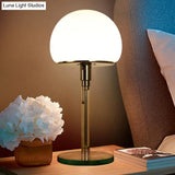 Contemporary White Glass Nightstand Lamp With Blue Reading Light