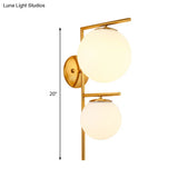 Contemporary White Glass Spherical Sconce With 2 Gold Heads - Wall Mounted Light Fixture