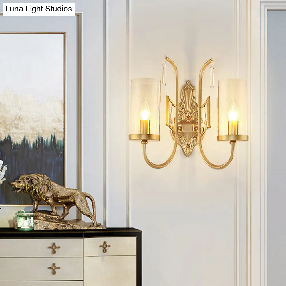 Country Clear Glass Wall Sconce With Curved Arm - Gold Cylinder Surface Lighting For Living Room