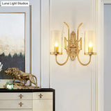 Country Clear Glass Wall Sconce With Curved Arm - Gold Cylinder Surface Lighting For Living Room