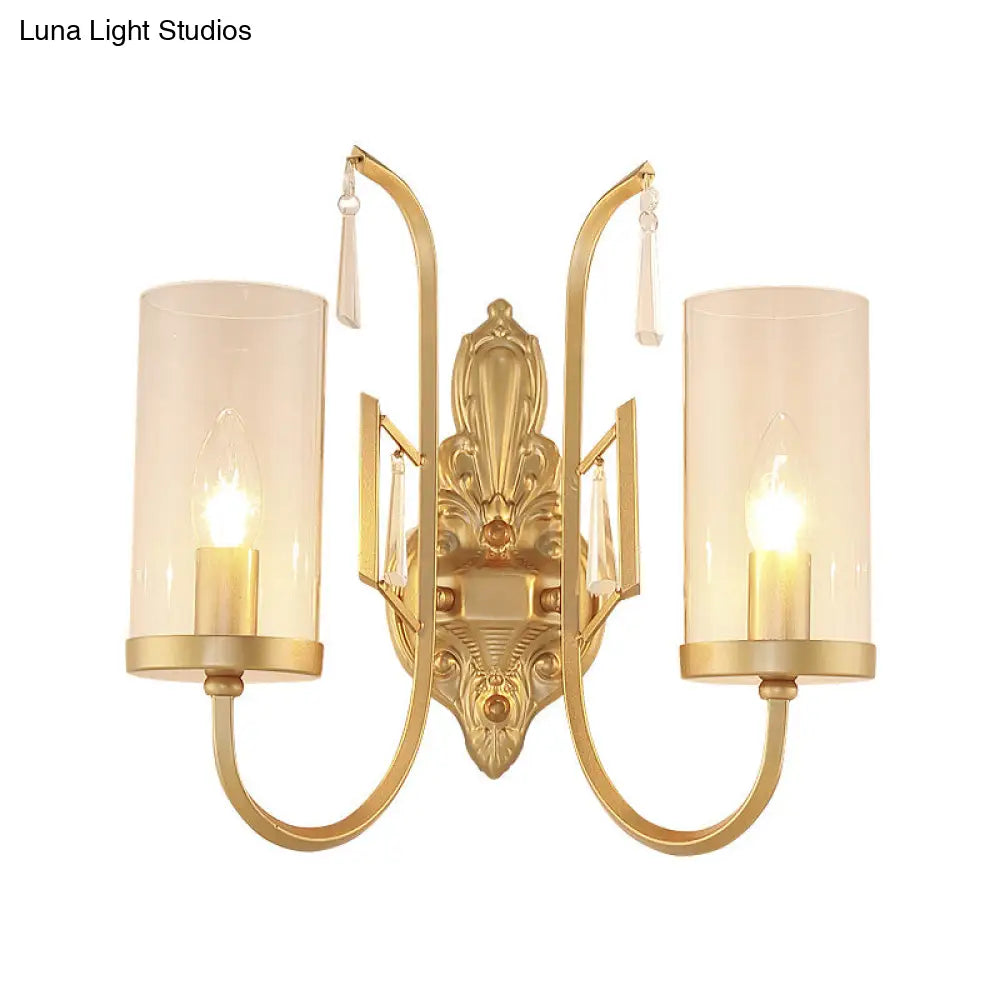 Country Clear Glass Wall Sconce With Curved Arm - Gold Cylinder Surface Lighting For Living Room