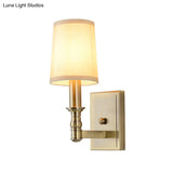Country Corridor Wall Light Fixture With Brass Frame And Cylinder Fabric Shade
