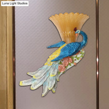 Country Style Flared Wall Sconce With Blue Peacock Design - 1 Bulb Amber Glass And Resin Lighting