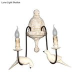Countryside 1/2-Light Brown Wall Lamp With Bird Deco - Candelabra Indoor Mount Lighting Fixture