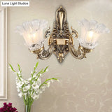 Countryside Flower Shaped Wall Lamp With Clear Ridged Glass And Brass Bulbs