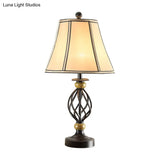 Cozy Countryside Flare Fabric Table Lamp With Swirled Black Cage Base - Perfect Night Light For