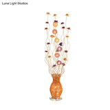 Curved Aluminum Floor Lamp With Led Light Floral Decor And Vase Base In Gold