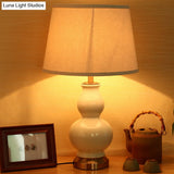 Curved Ceramic Nightstand Lamp: Modern Pink/White Task Light With Fabric Shade 13/16 Wide