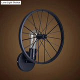 Decorative Metallic 1-Head Wall Sconce Lighting In Black - Wheel Design