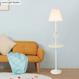 Fabric Conic Floor Standing Lamp For Kids - Single Beige/Pink Lighting With Table And Bow-Knot