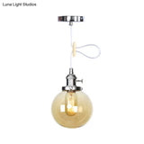 Farmhouse Orbit Pendant Light With Amber/Clear Glass And Adjustable Cord In 3 Elegant Finish Options