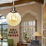 Farmhouse Orbit Pendant Light With Amber/Clear Glass And Adjustable Cord In 3 Elegant Finish Options
