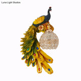 Farmhouse Resin Peacock Wall Sconce With Crystal Hemisphere Shade & 1 Bulb