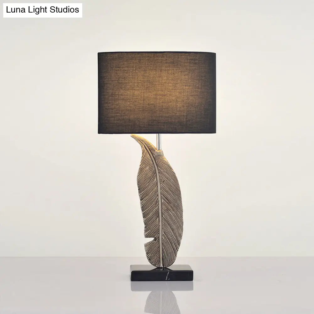 Feather Base Nightstand Lamp In Black With Classic Drum Shade For A Cozy Bedside Ambiance