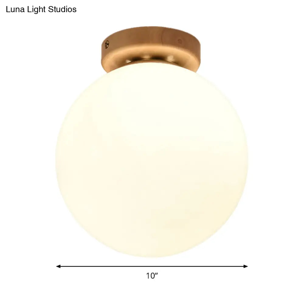 Frosted Glass Globe Ceiling Mount Light In White - Ideal For Modern Bathrooms