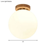 Frosted Glass Globe Ceiling Mount Light In White - Ideal For Modern Bathrooms
