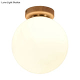 Frosted Glass Globe Ceiling Mount Light In White - Ideal For Modern Bathrooms