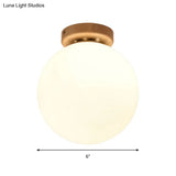 Frosted Glass Globe Ceiling Mount Light In White - Ideal For Modern Bathrooms