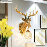 Gold Farmhouse Sconce Light With Faceted Crystal Sphere And Sika Deer Head Design