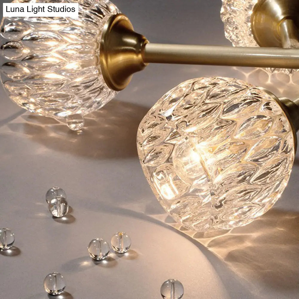 Gold Finish Chandelier With Metallic Branch Design And Clear Crystal Shade