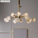Gold Finish Chandelier With Metallic Branch Design And Clear Crystal Shade