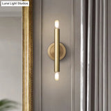 Gold Metal Wall Sconce With Dual-Head And Straight Arm For Luxurious Bedroom Lighting